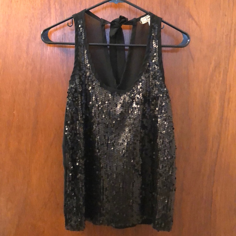 Black sequenced top with a chiffon back